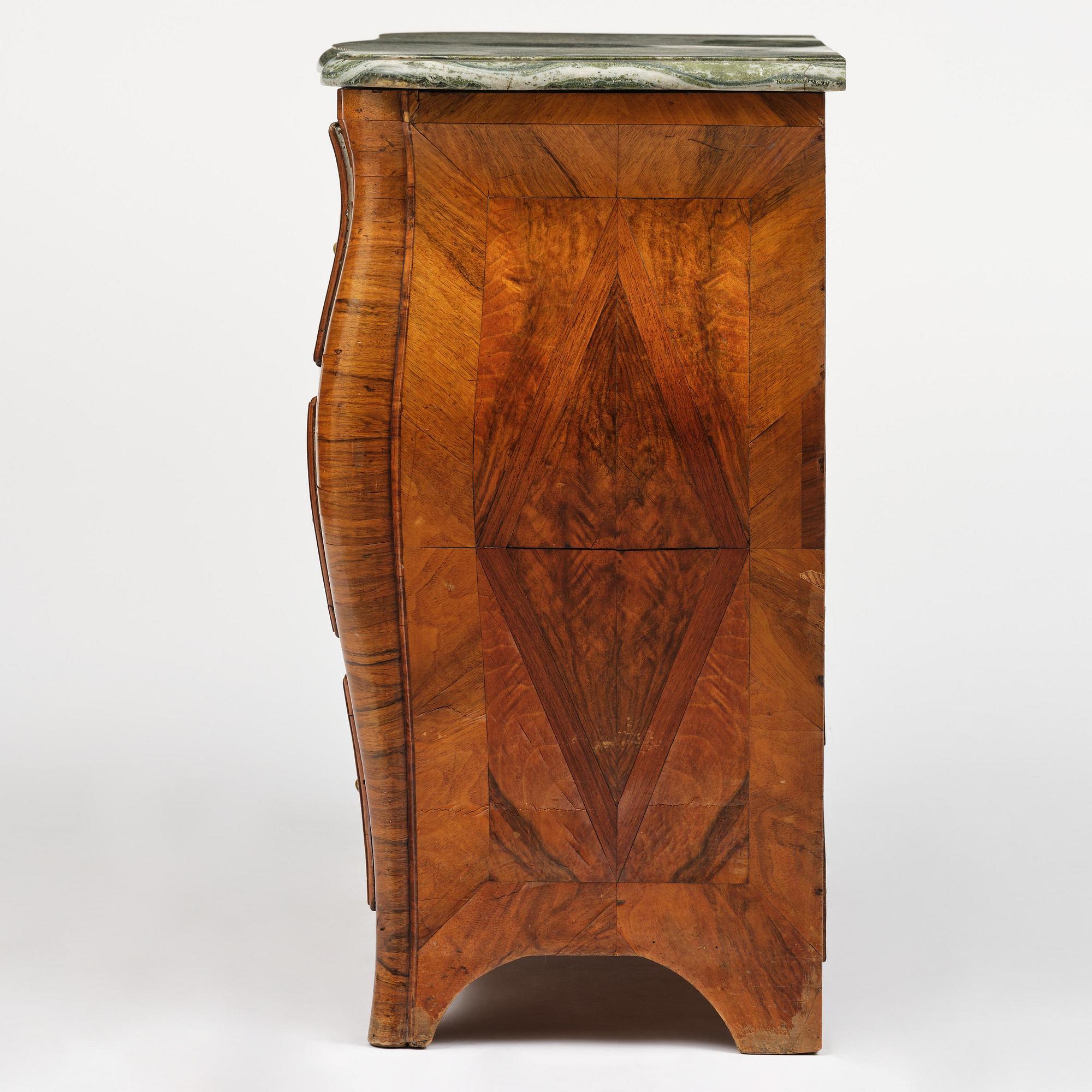 A Swedish rococo parquetry commode by C. Linning (master in Stockholm 1744-79).