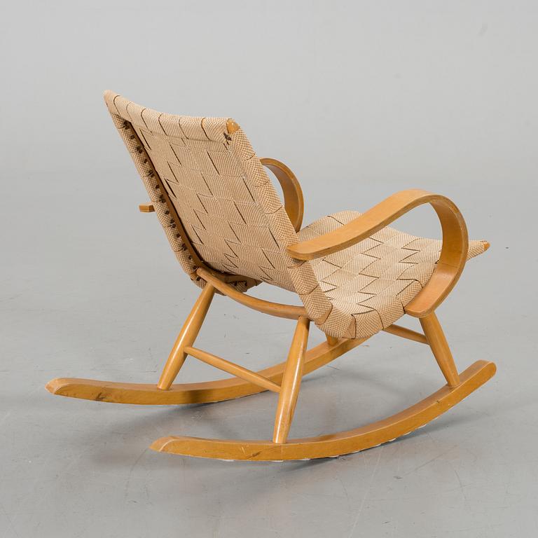 A 1940s possibly Yngve Ekstrom rocking chair.
