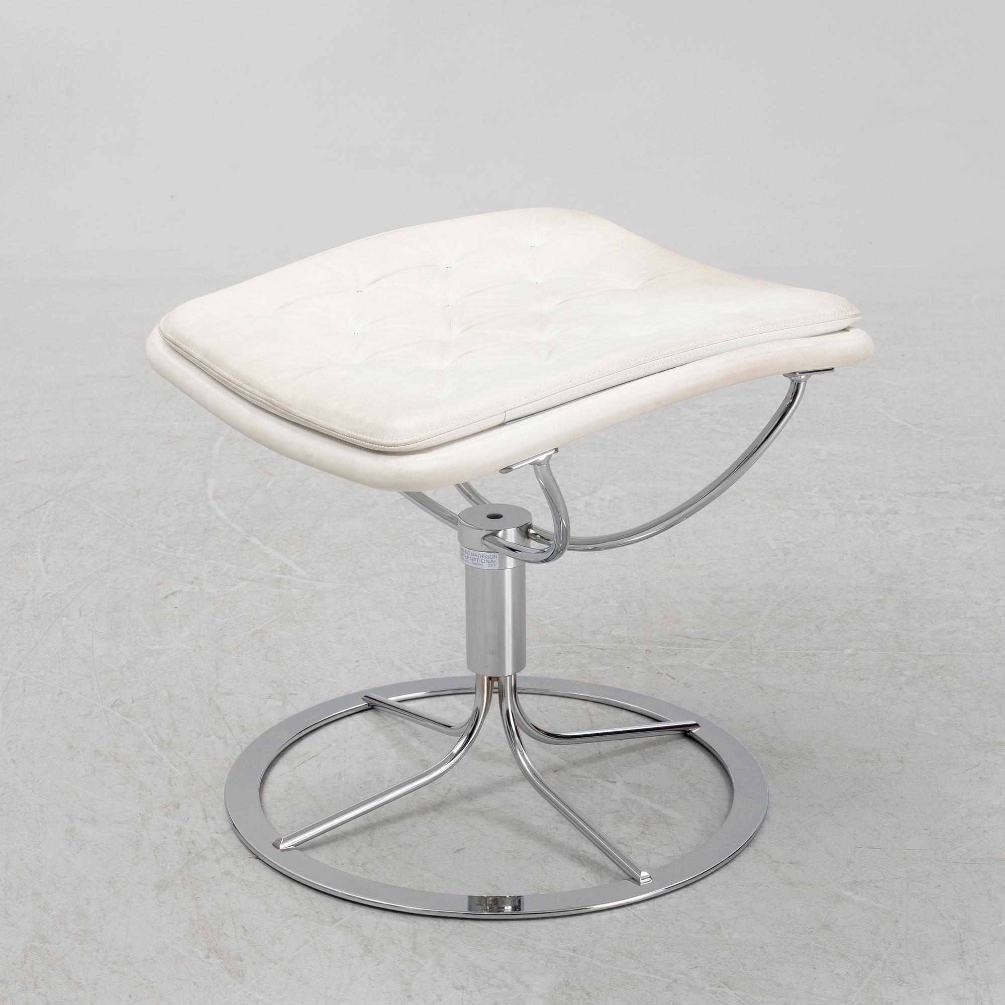 A 'Jetson' foot stool by Bruno Mathsson.