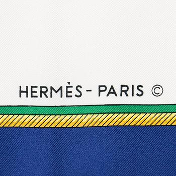 Hermès, a 'Les Voitures à Transformation' silk scarf.