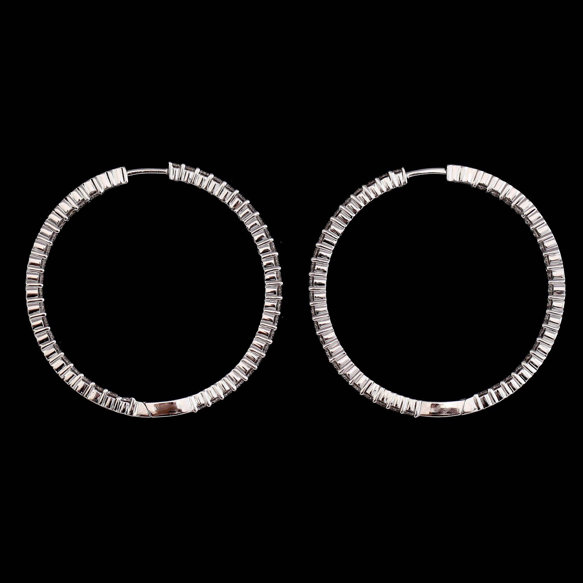A pair of diamond, 2.64 cts in total, earrings.