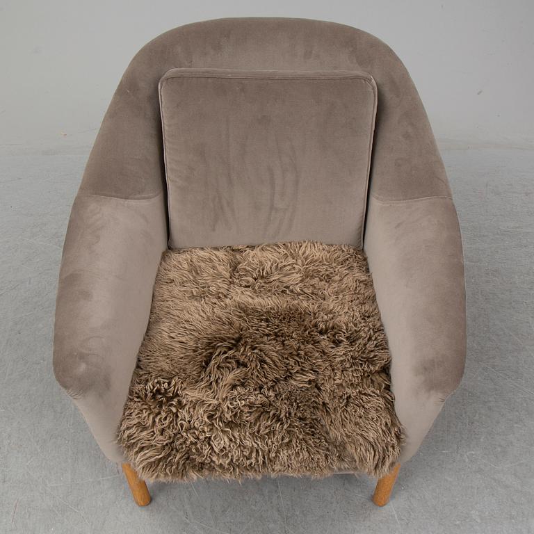 KERSTIN HÖRLIN-HOLMQUIST, a 'Napoleon' easy chair, Nyköping, Nordiska Kompaniet, mid 20th century.