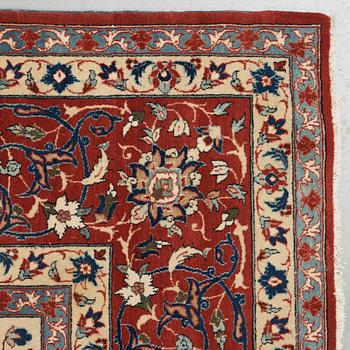 A old Esfahan carpet, around 299 x 210 cm.