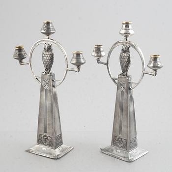 A pair of Jugendstil candelabra, Württembergische Metallwarenfabrik (WMF), Germany, early 20th Century.