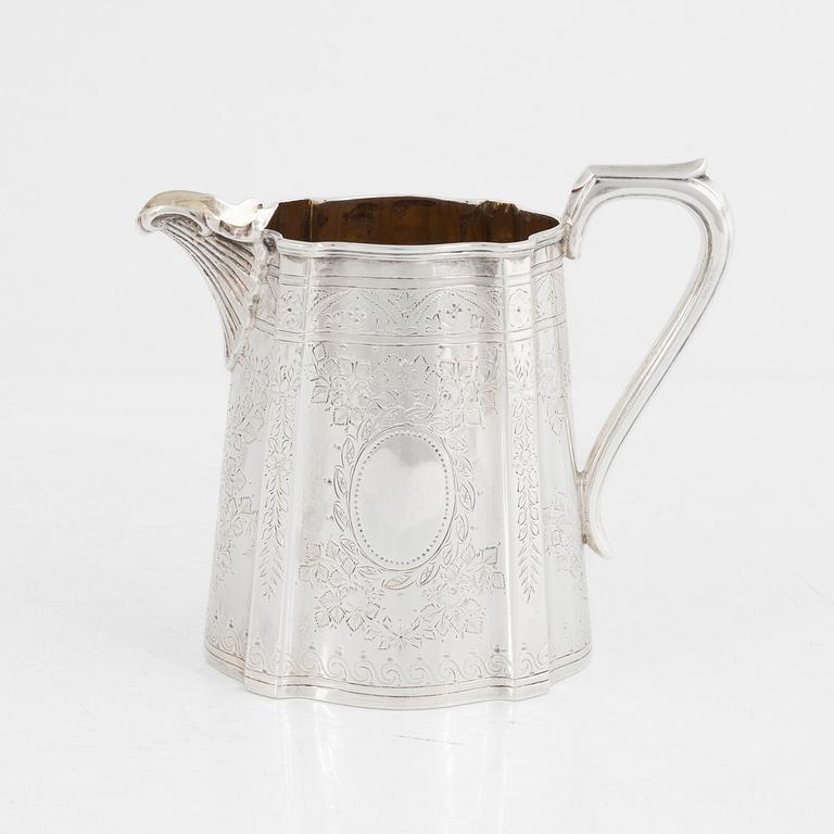 An English Silver Coffee Pot, Teapot, Creamer and Sugar Bowl, mark of Walker & Hall (John Edward Bingham) Sheffield 1891.