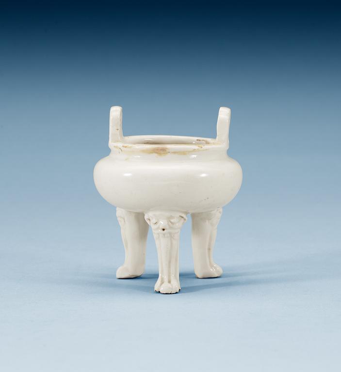 A blanc de chine miniature tripod censer, Qing dynasty, Kangxi (1662-1722).