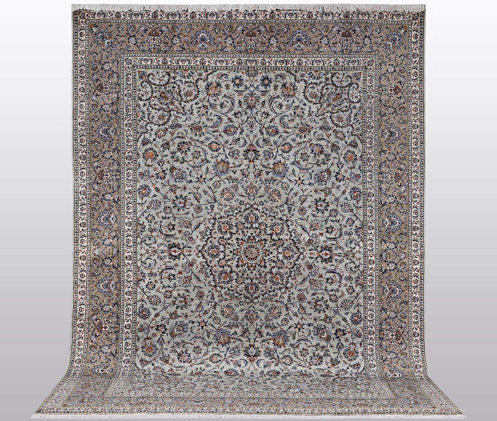 A carpet, Kashan, signed Fani, ca 420 x 300 cm.