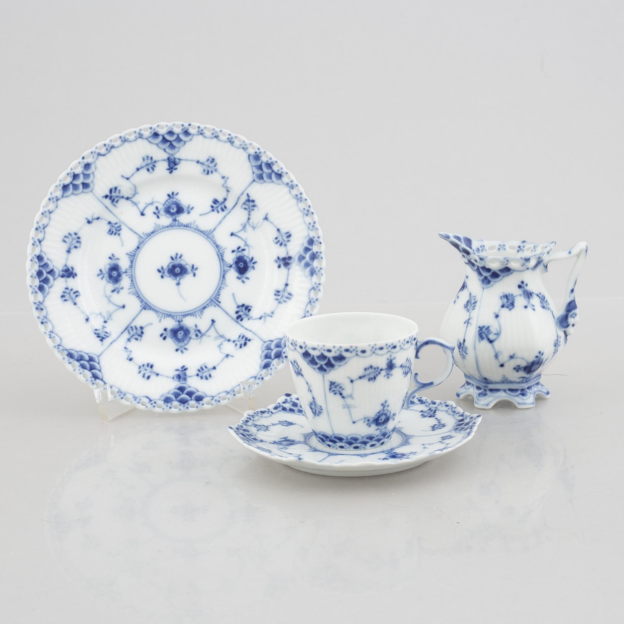 A set of thirteen 'Musselmalet' porcelain service parts, Royal Copenhagen, Denmark.