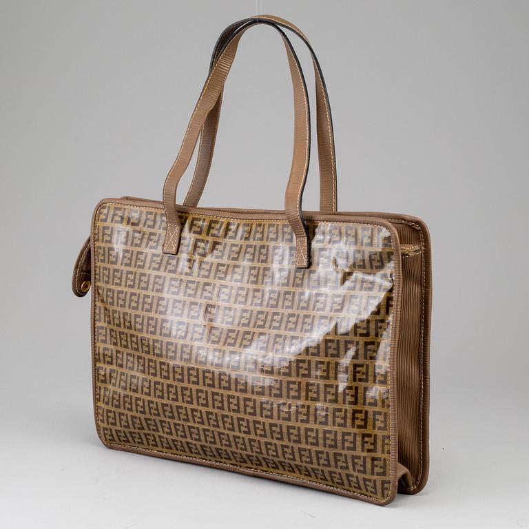 FENDI, a textile handbag.