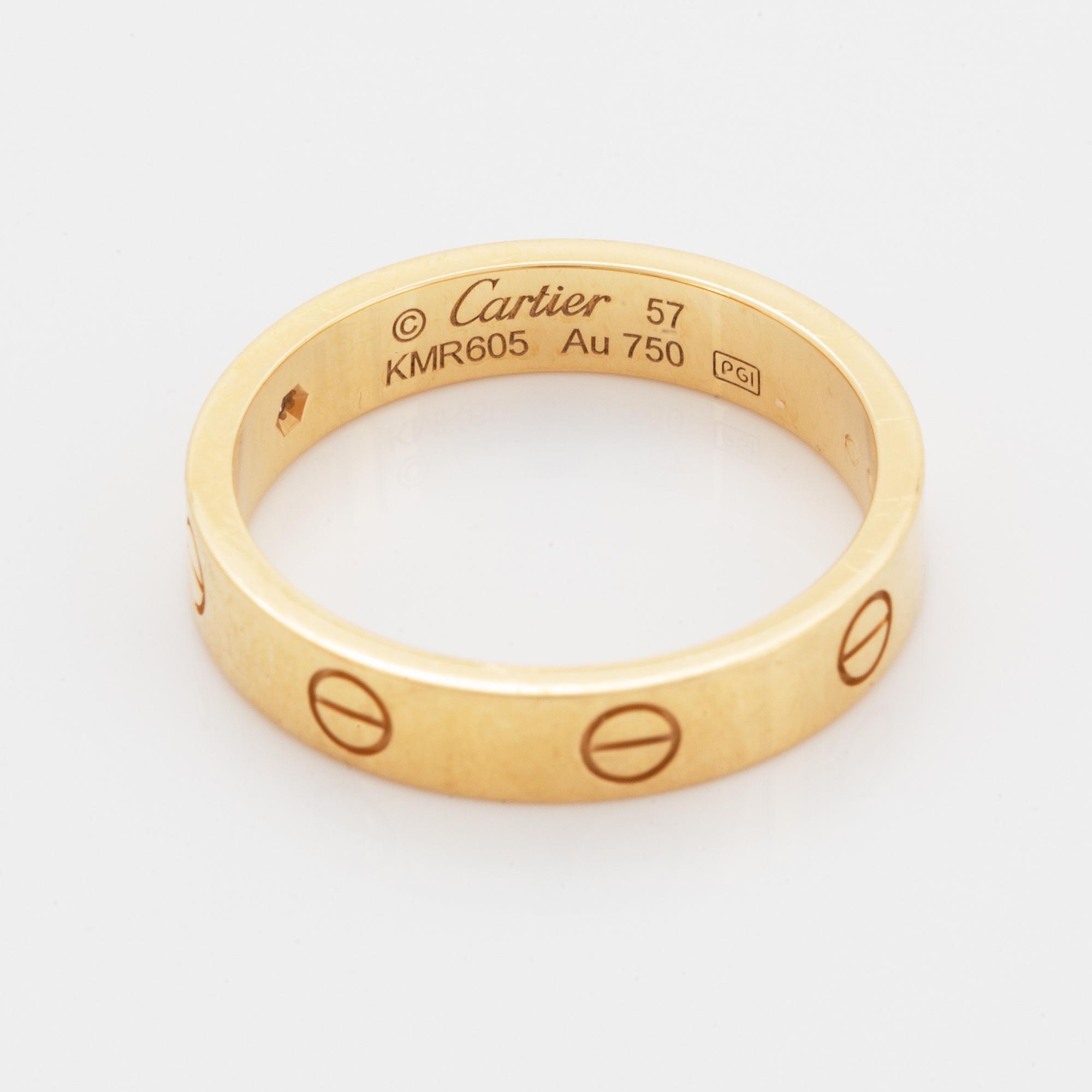 Cartier ring "Love" 18K guld med en rund briljantslipad diamant.