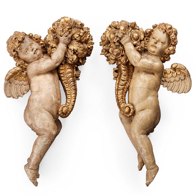 A pair of German Baroque circa 1700 wooden sculptures.