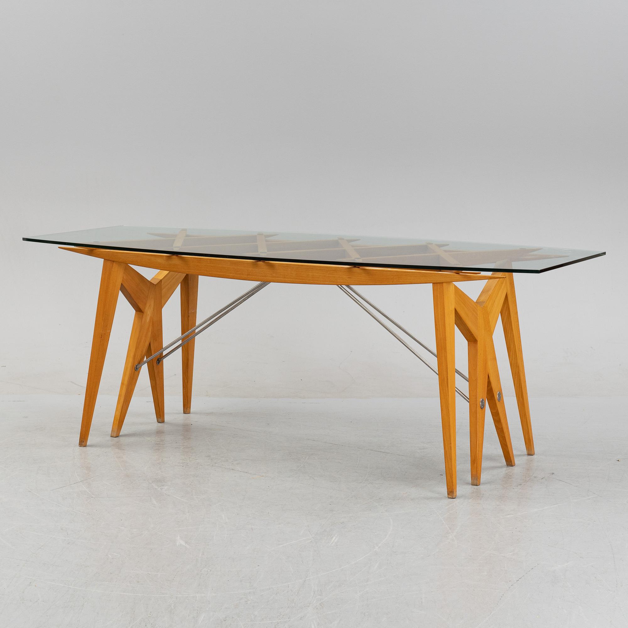 A dining table, Italy 1980-90s.