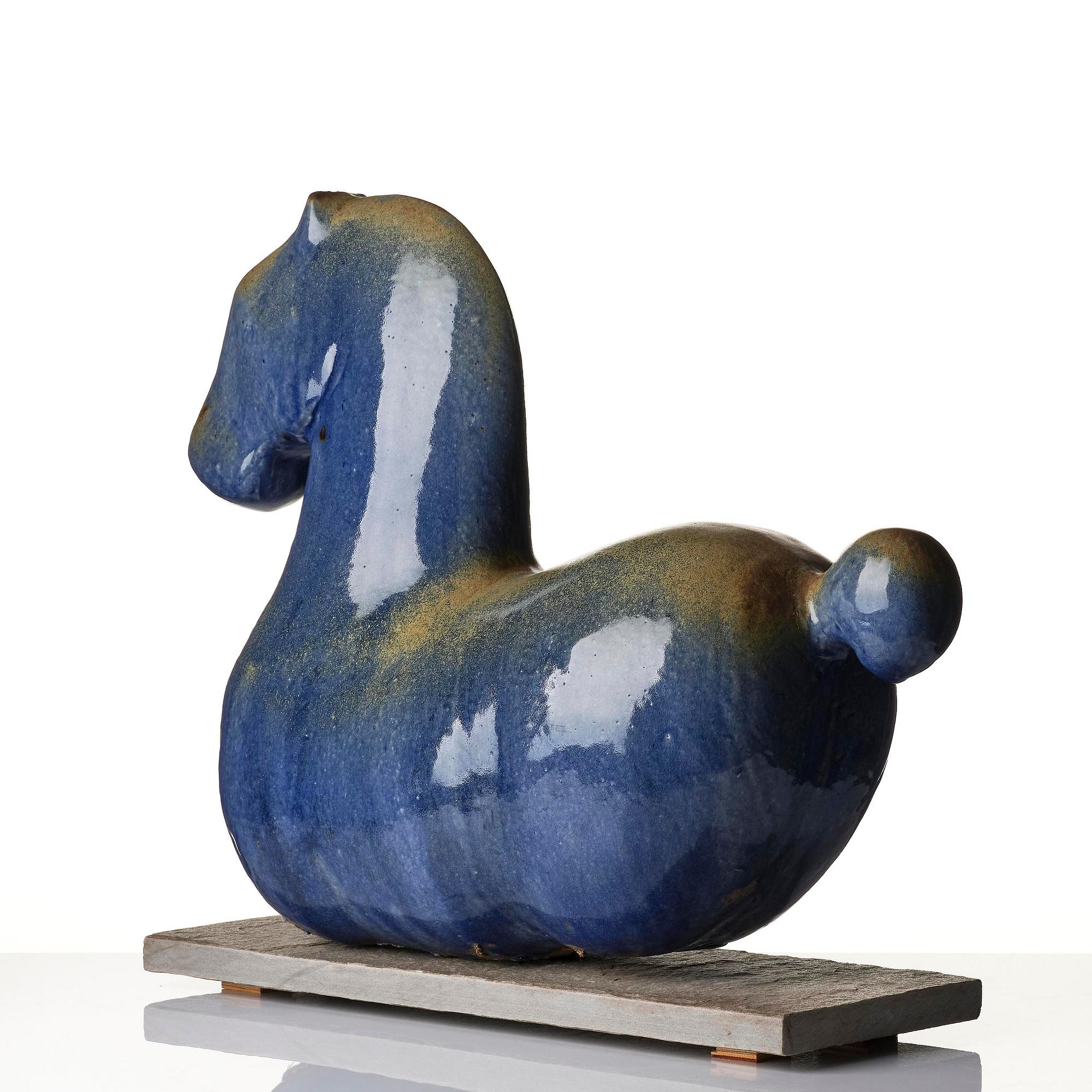 Ulla & Gustav Kraitz, a stoneware sculpture of a reclining horse, own studio, Förslöv.
