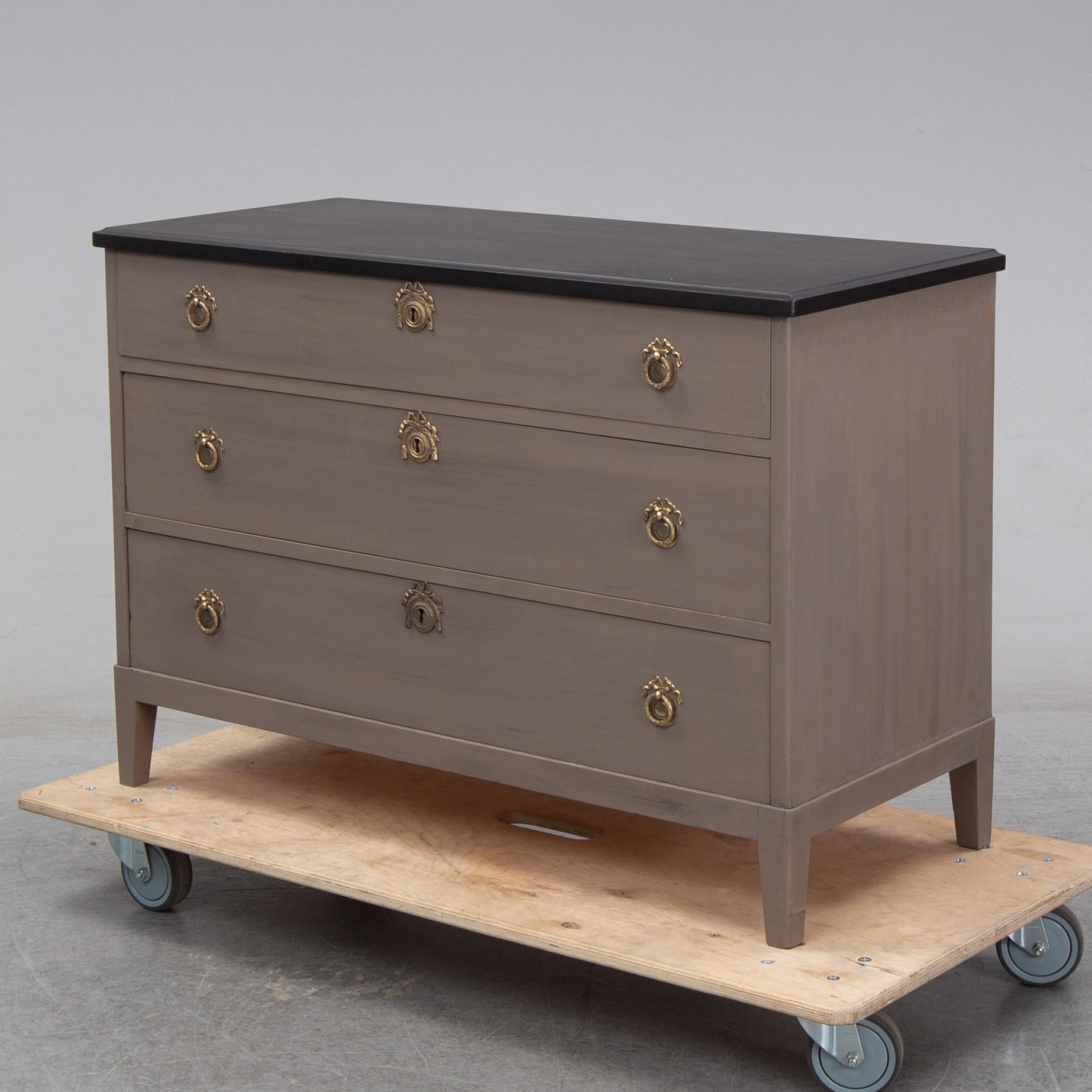 A painted chest of drawers, second half of the 20th Century.