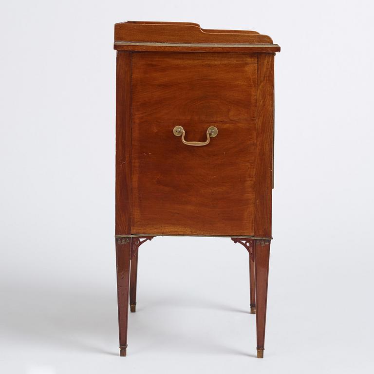 A late Gustavian mahogany-veneered chamberpot cupboard, circa 1800.