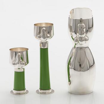 A decanter and snapsglasses "Dudes" in sterling silver and glass. Ru Runeberg 2007.