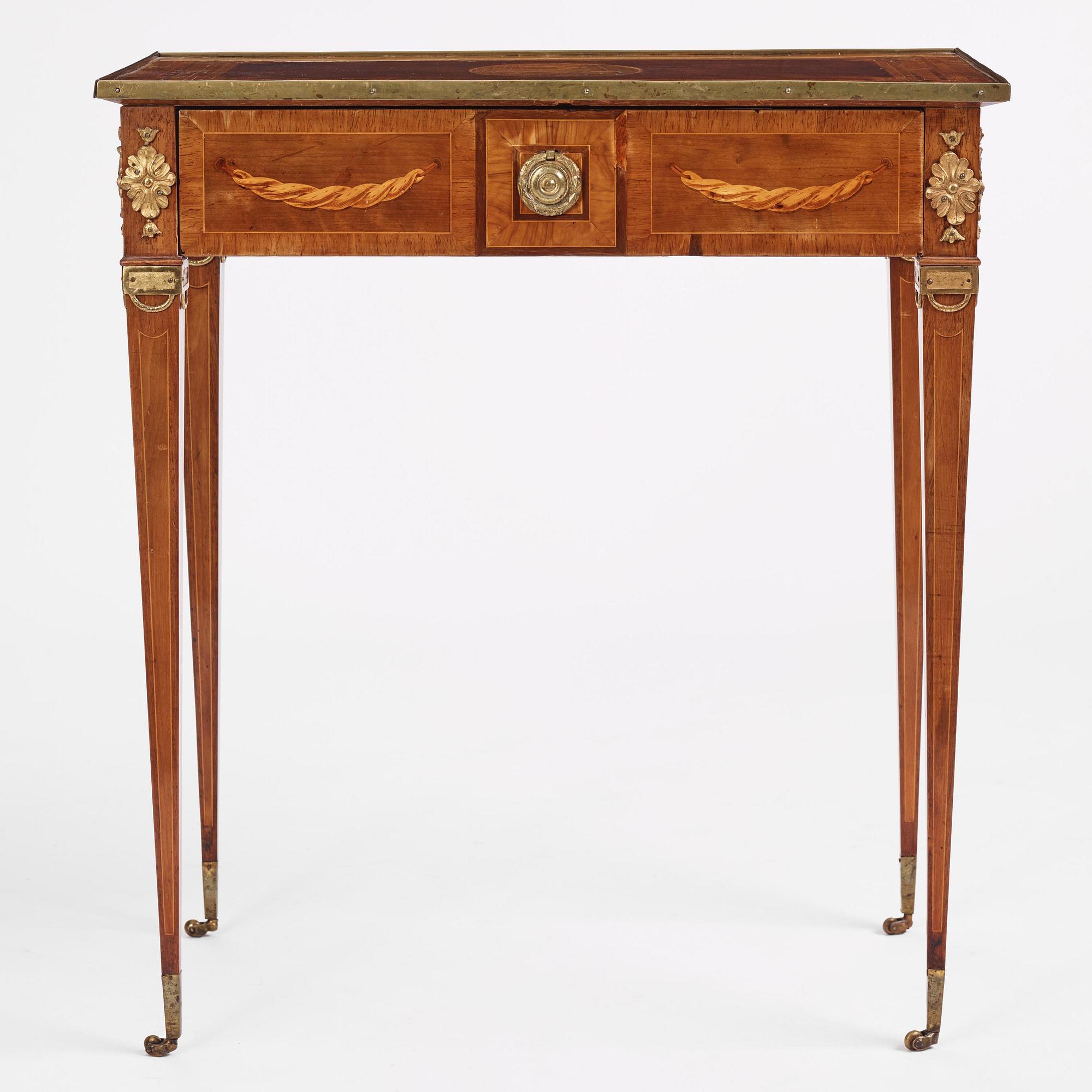 A Gustavian marquetry and gilt brass-mounted table by G. Iwersson (master in Stockholm 1778-1813).