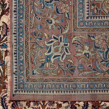 A RUG. A semi-antique silk Kashan. 205,5 x 131,5 cm.