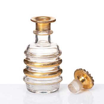 A set of Russian glasses (13 pcs.) and a bottle with stopper, 19th Century.