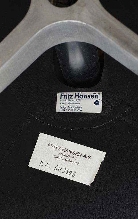 An Arne Jacobsen black leather 'Egg' chair, Fritz Hansen, Denmark 2007.