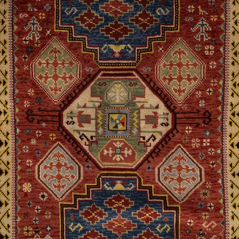 A 1940's Spanish rug Of Kazak design, ca. 139 x 93 cm.