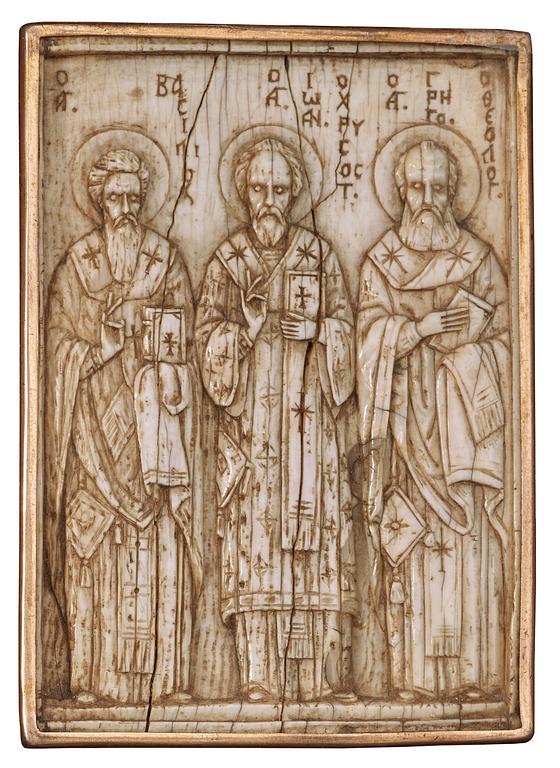 A probabaly Byzantine (Middle Ages to 1453) ivory icon/relief depicting Basileios, Chrysostomus and Gregorius.