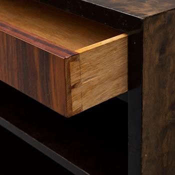 a 1930's stained birch bookshelf.