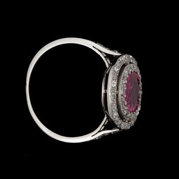 A 2.05 ct untreated Burmese ruby surrounded by old-cut diamonds, total carat weight circa 0.50 ct.