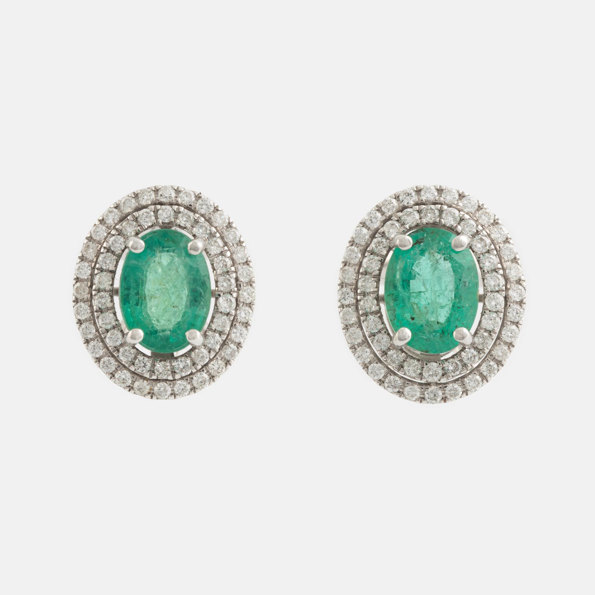 Emerald and brilliant cut diamond earrings.