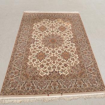 An Isfahan rug, central Persia, signed, 228 x 150 cm.