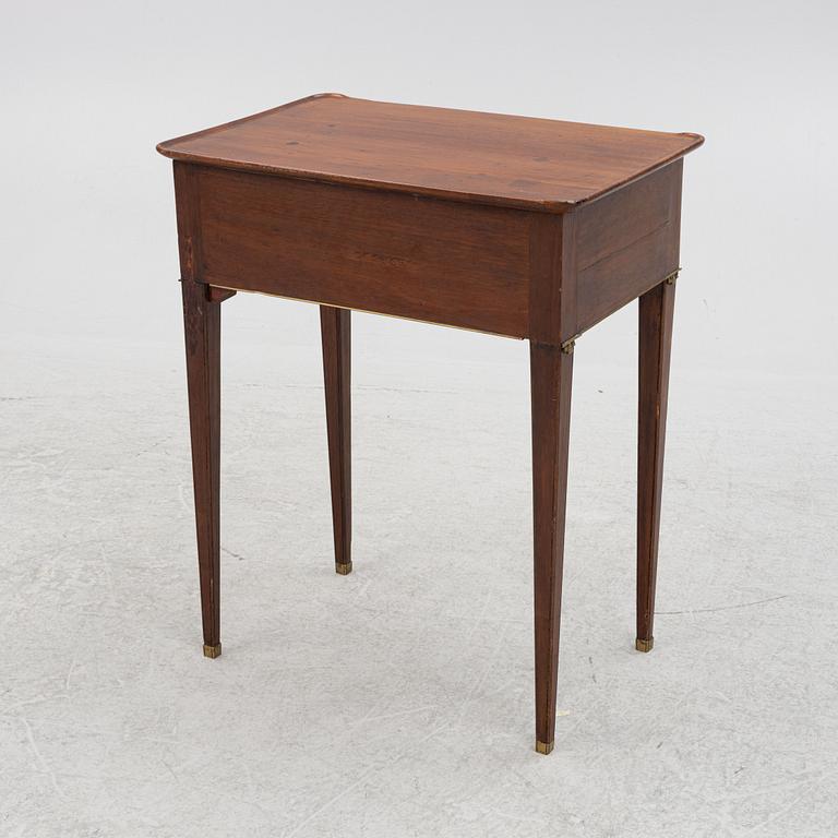 A late gustavian mahogany table, late 18th century.