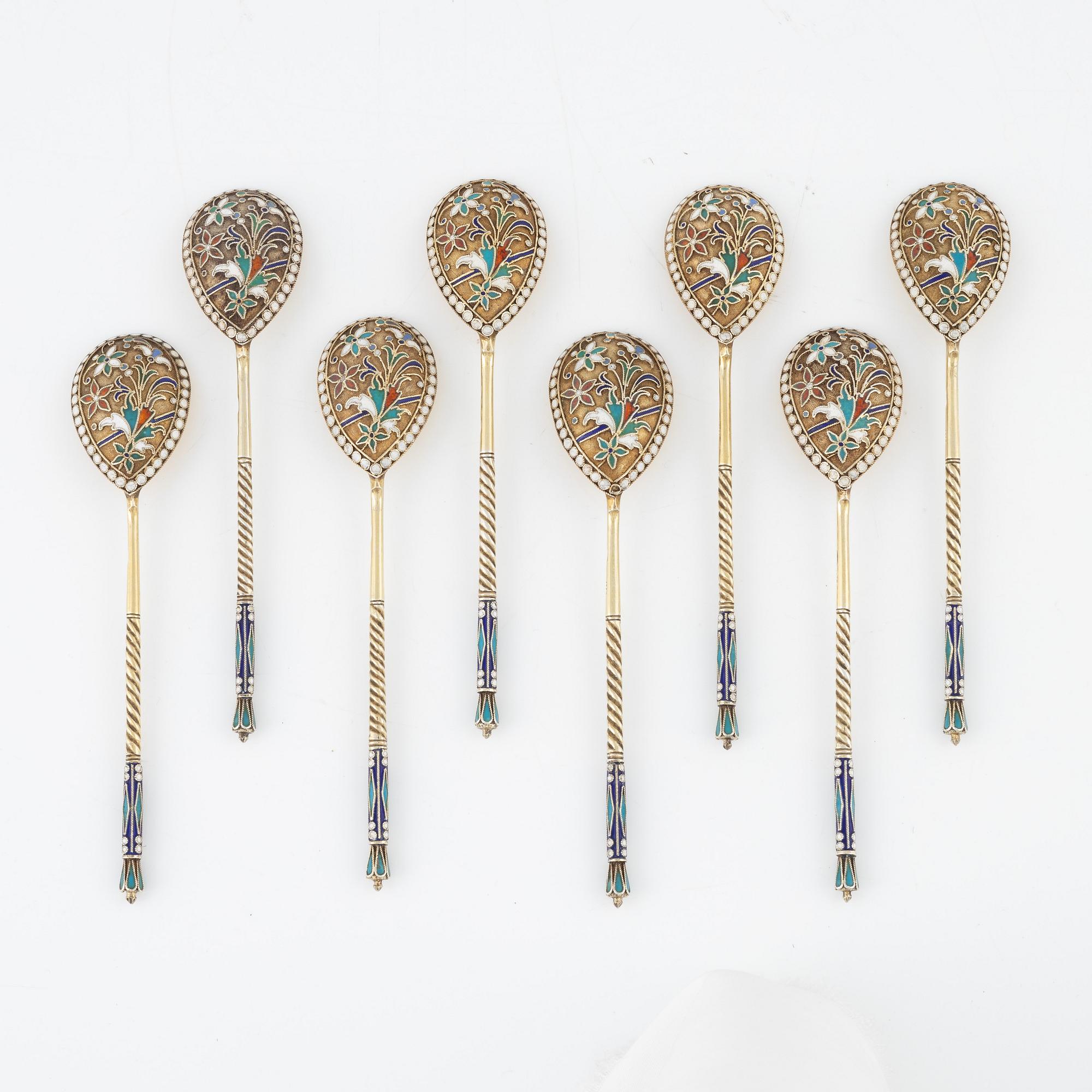 Eight Russian gilded silver and enamel spoons, Moscow, 1896-1908.