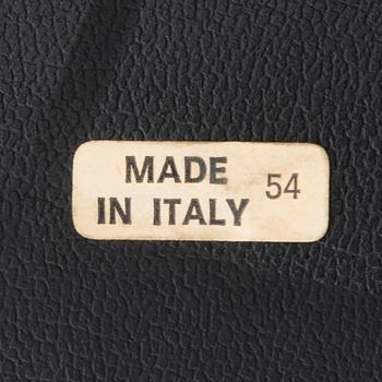 A Set of Three Chrome and Black Leather Chairs.