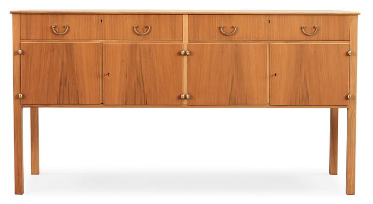 A Josef Frank walnut sideboard with a burrwood top, Svenskt Tenn.