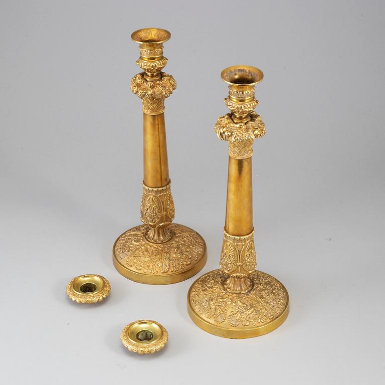 A pair of French Empire candlesticks, first half of the 19th century.