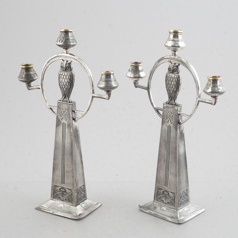 A pair of Jugendstil candelabra, Württembergische Metallwarenfabrik (WMF), Germany, early 20th Century.