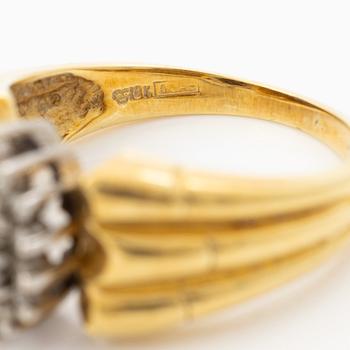 18K gold ring with diamonds.