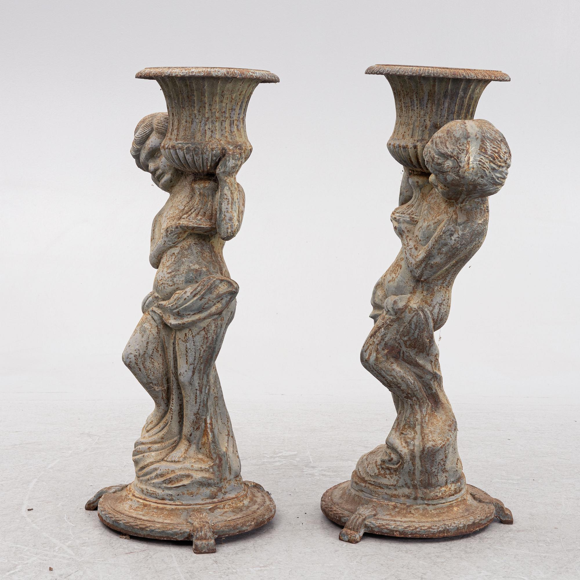 Skulpturer, ett par, omkring år 1900.