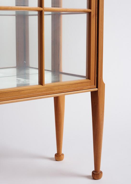 Josef Frank, a walnut showcase cabinet, Svenskt Tenn, Sweden, model B 2217, probably 1950s.