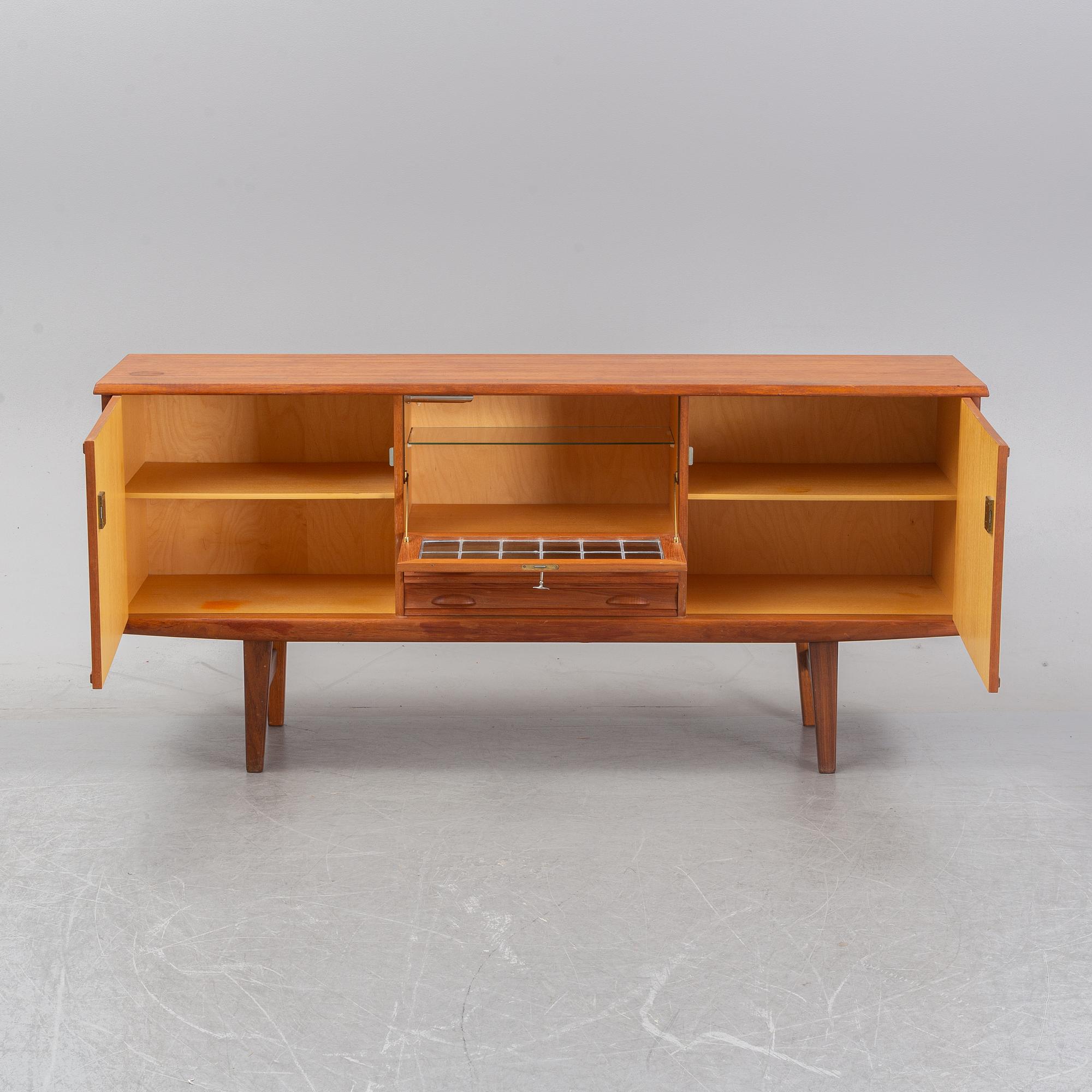 A teak sideboard, 1950/60'.