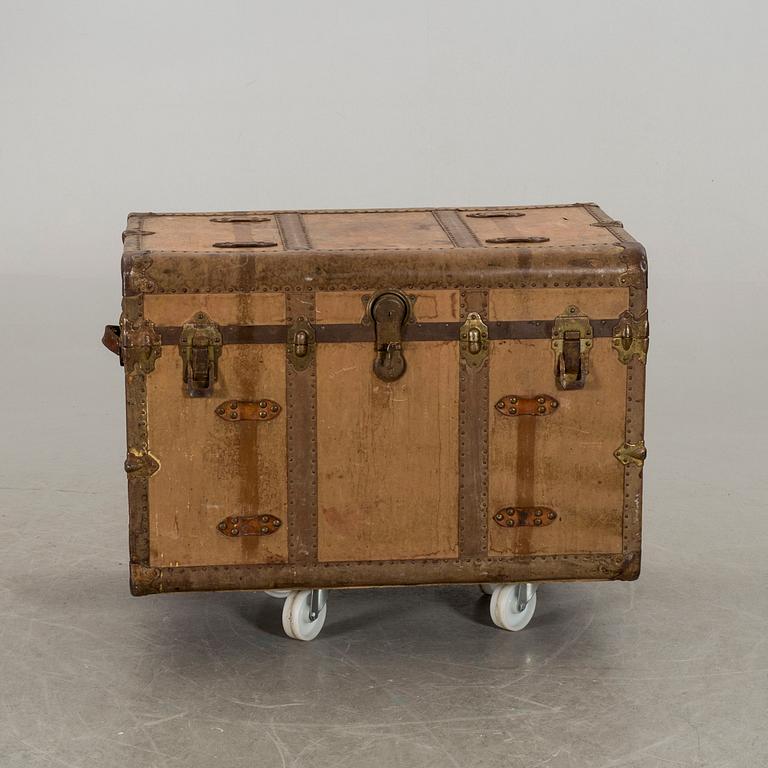 An early 20th century leather trunk.