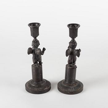 A pair of German (Berliner Eisen) Empire iron candle sticks.