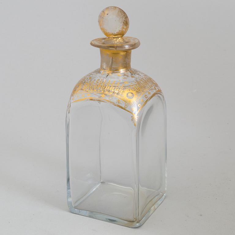 A first half of the 19th century wooden casket containing 6 flasks 2 glasses.
