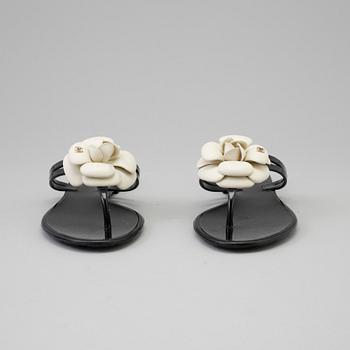CHANEL, a pair of black plastic sandals. Size 38.