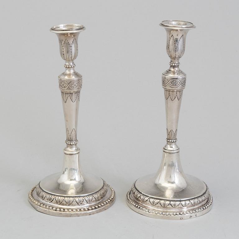 A pair of Italian early 19th century candlesticks, mark of Naples 1804.