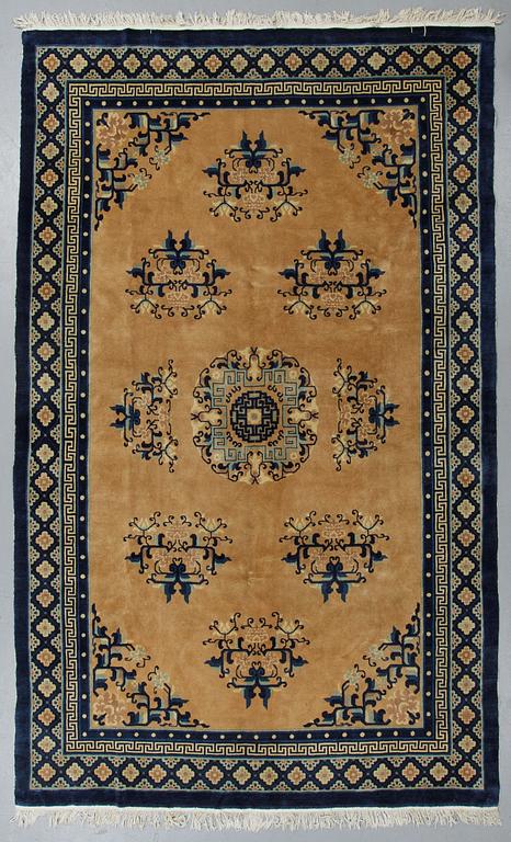 A carpet, semi-antique/Old China, ca 302 x 196 cm.