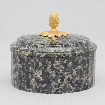 A Swedish Empire 19th century aglomerat stone butter box.