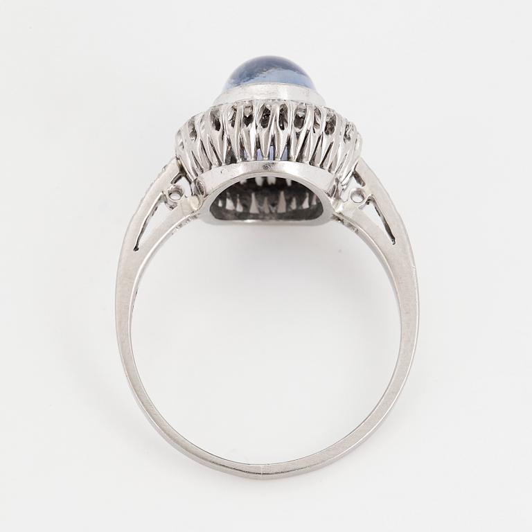 Cabochon-cut sapphire and eight-cut diamond ring.