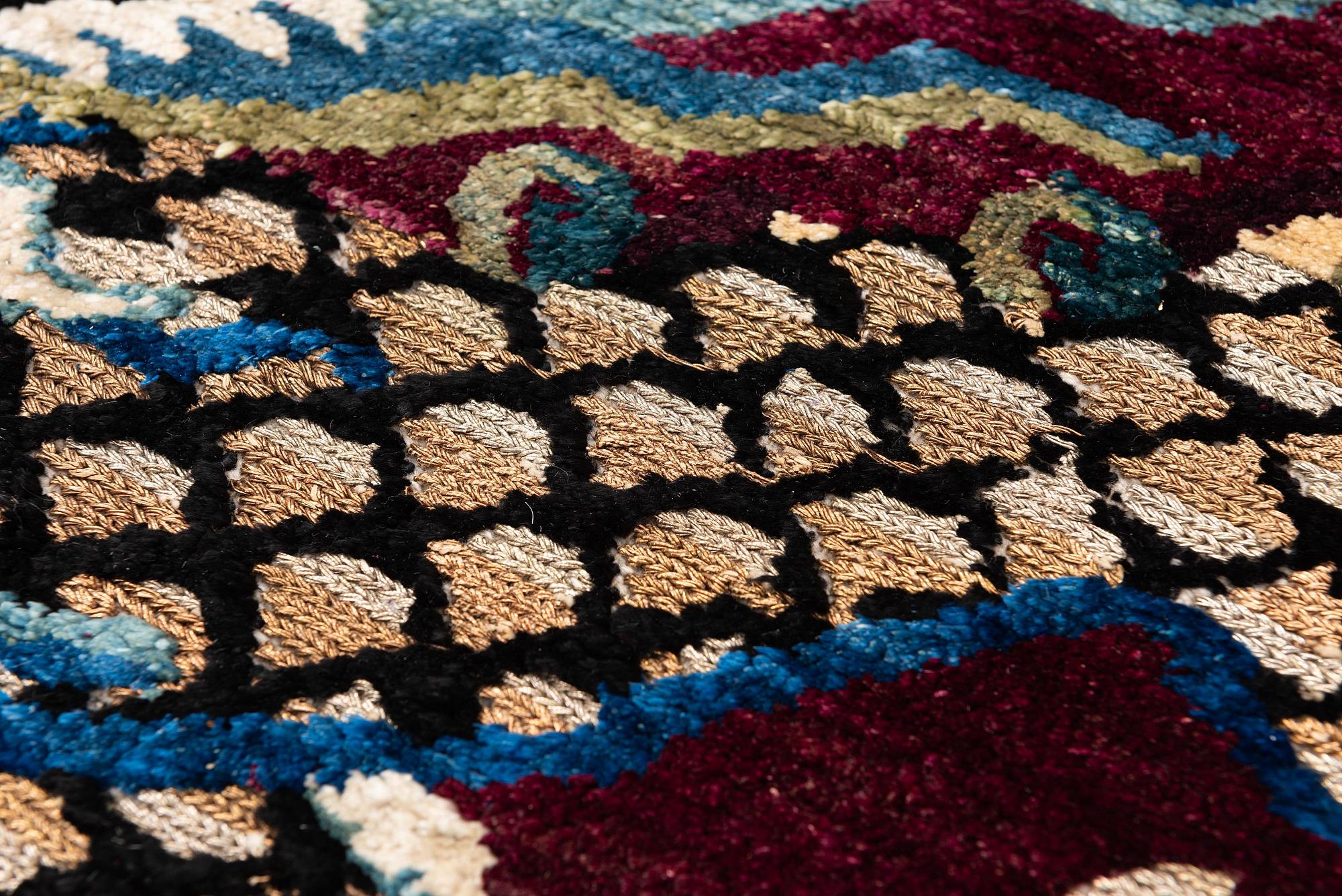 A Chinese silk and metal-thread 'Dragon' pillar rug, Bejing, North China, around 1910, c. 234x151 cm.