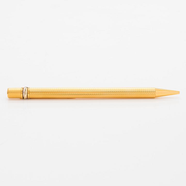 Cartier, must de Cartier, a "Trinity" ballpoint pen.